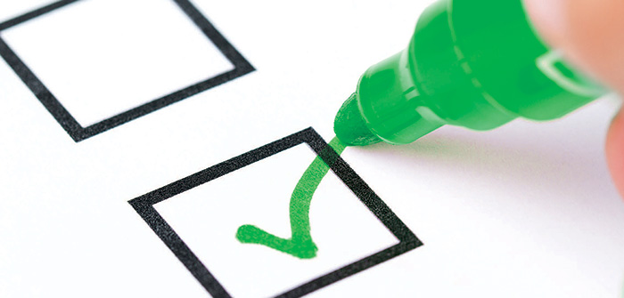 Checklist being checked off.