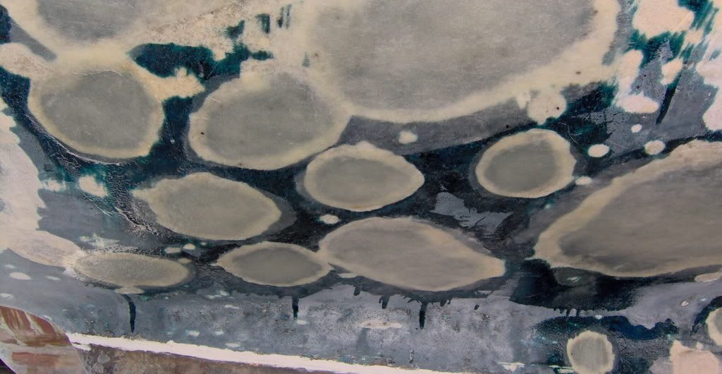 Fiberglass blisters on hull of a yacht.