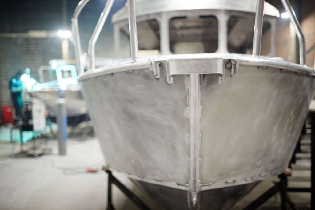 Boat in manufacturer shop getting built.
